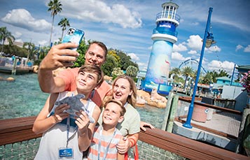 Family selfie near SeaWorld Orlando Entrance